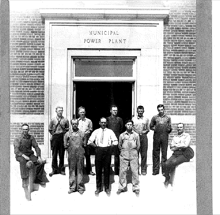 1st power plant employees old photo of first power plant employees in front of entrance